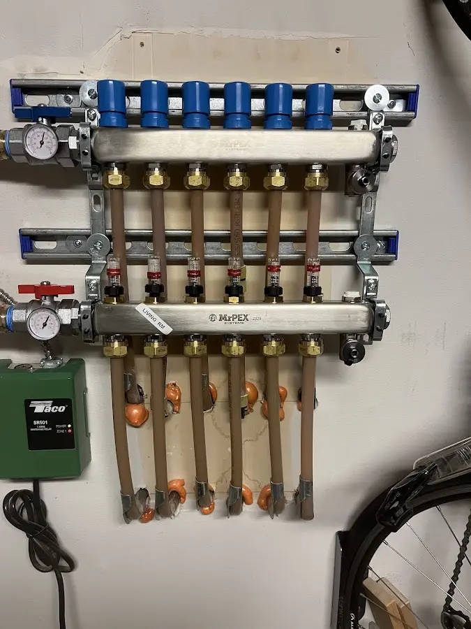 Plumber performing Water Heater Repair at a residential property in Ellicott City